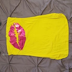 Bright yellow and pink lips tube top. Never worn. Size medium. Smoke free home.